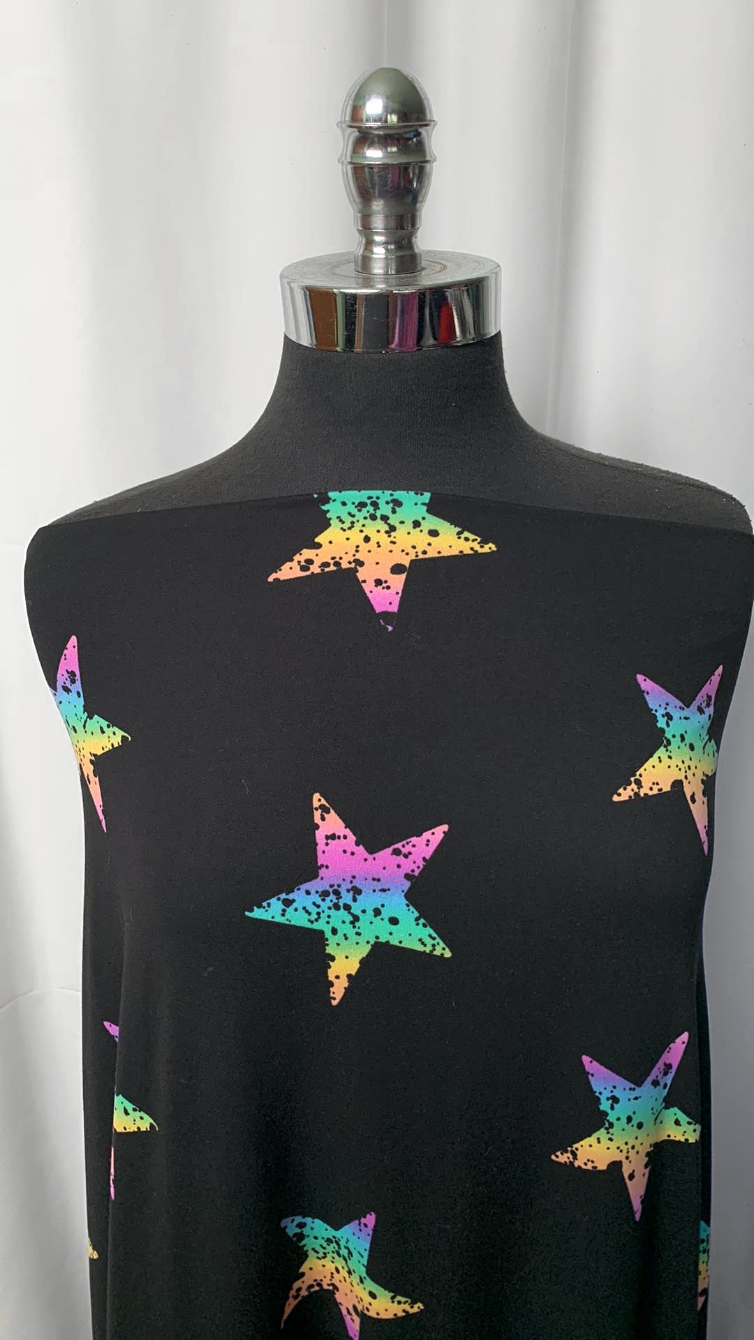 Splatter Stars on Black - Double Brushed Poly Spandex - By the Yard