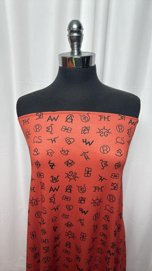 Rust Symbols - Double Brushed Poly Spandex - 2 Yard Cut
