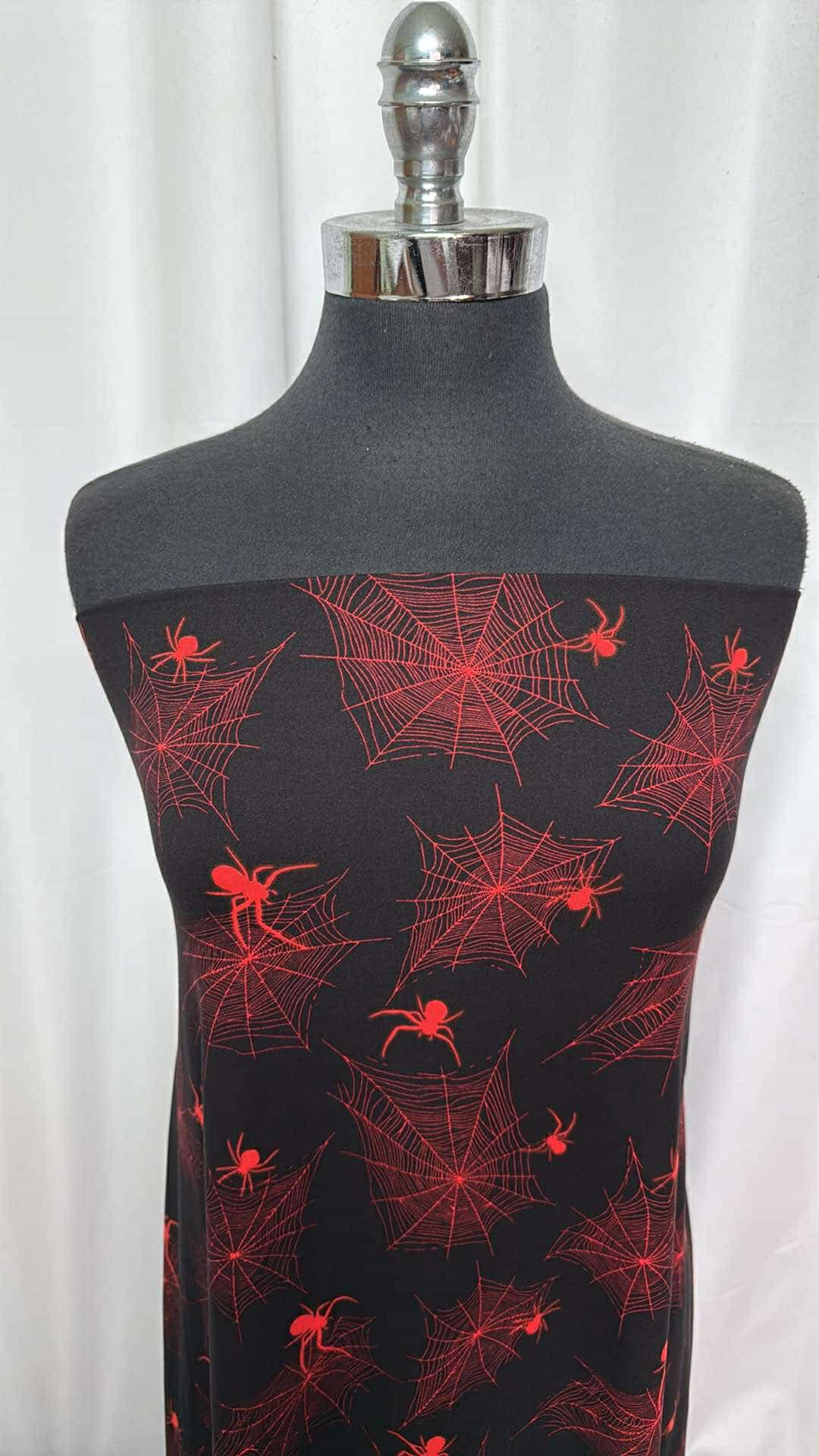 Orange/Black Webs - Double Brushed Poly Spandex- 2 Yard Cut