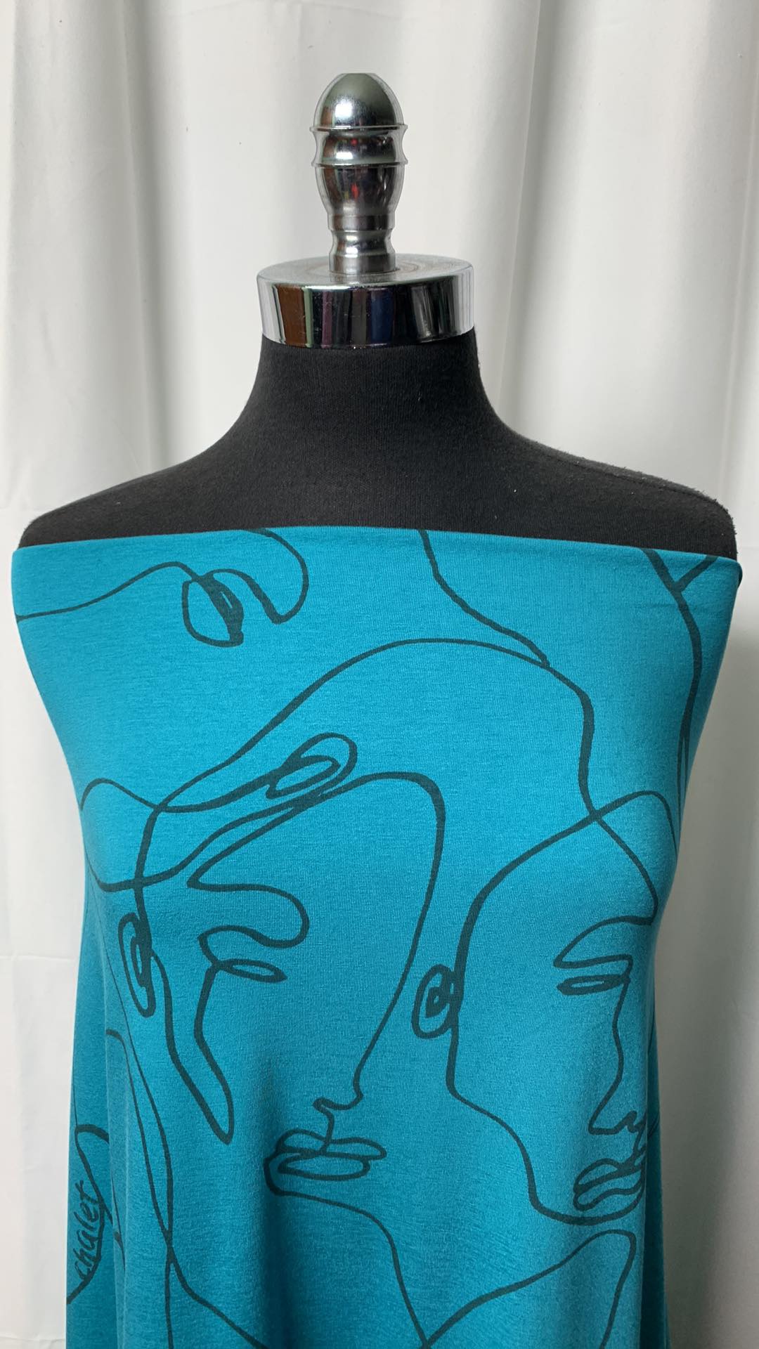 Turquoise Lined Faces - Bamboo/Cotton/Spandex - By the Yard